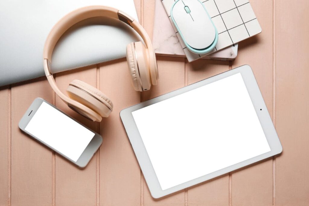 A home office desk with a laptop and headphones.