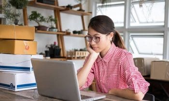 eBay seller working from home office, preparing shipments