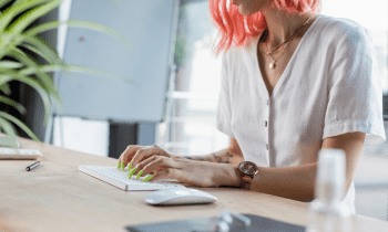 Young woman working on a computer at home