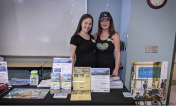 Kara and her mom promoting their Cruise Planners home travel business