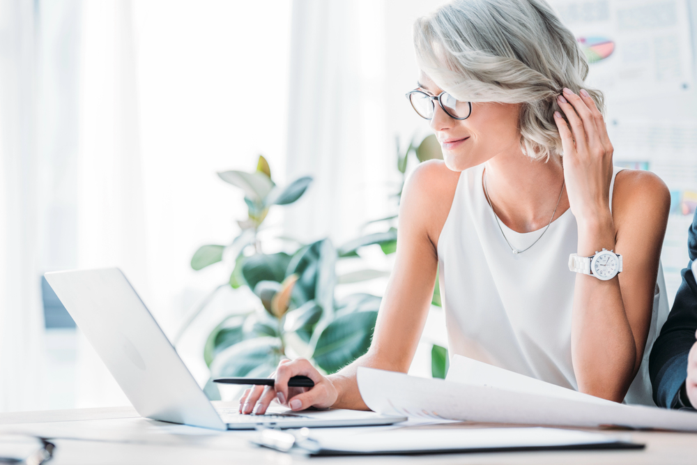 Woman on her laptop working from home with Amazon