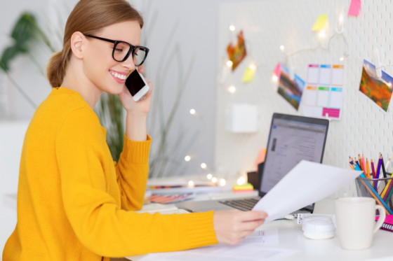 Woman working at her desk at home for blog post 99 career ideas