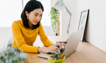 Young Asian woman working from home at her low-stress job