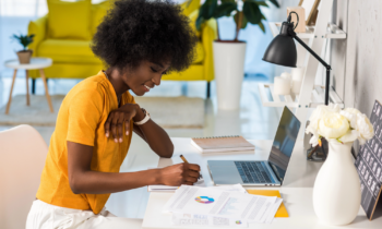 Young black woman working her remote banking jobs