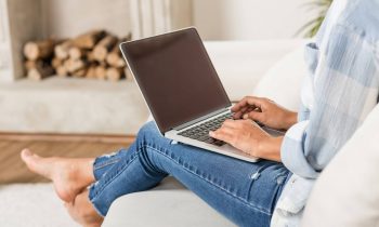 woman on laptop making money surfing the web